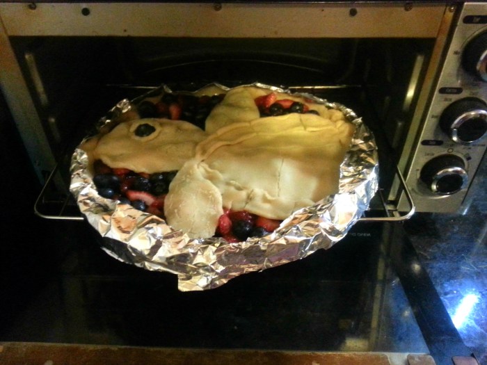 Putting pie into oven