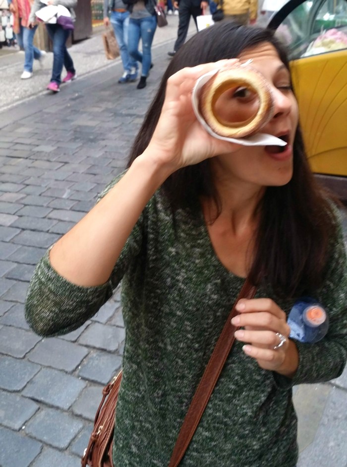 Peeking through a trdelnik pastry in Prague